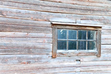 Image showing Old log house window with rustic frame
