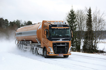 Image showing Volvo FH Semi Tanker on Snowy Highway