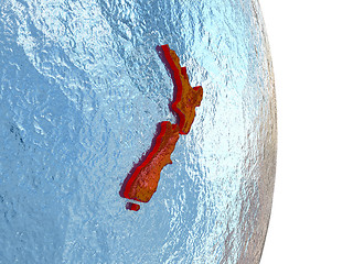 Image showing New Zealand in red on Earth
