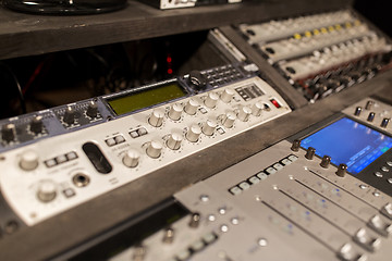 Image showing music mixing console at sound recording studio