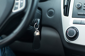 Image showing car key in ignition start lock