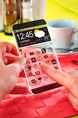 Image showing Smartphone with transparent screen in human hands.