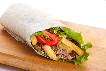 Image showing beef burrito with peppers, fried potato and tomato