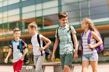 Image showing group of happy elementary school students walking