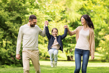 Image showing happy family walking in summer park and having fun