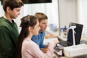 Image showing children with laptop and wind turbine at school