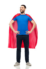 Image showing happy man in red superhero cape