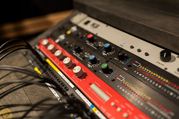 Image showing music mixing console at sound recording studio