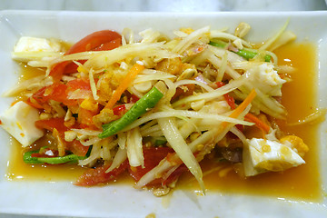 Image showing Green papaya salad on white plate