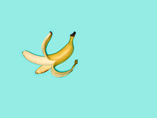 Image showing Single banana against blue background