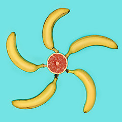 Image showing The group of bananas against blue background