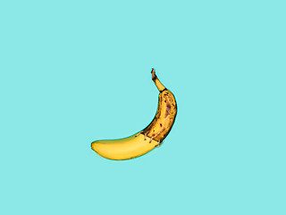 Image showing Single banana against blue background
