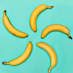 Image showing The group of bananas against blue background