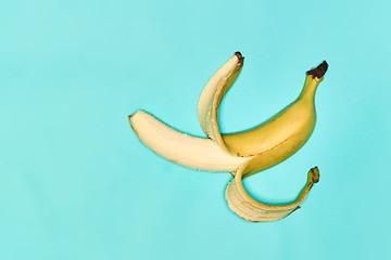 Image showing Single banana against blue background