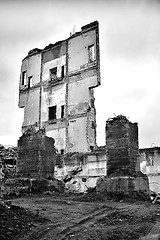 Image showing Pieces of Metal and Stone are Crumbling from Demolished Building