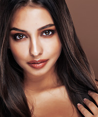 Image showing cute happy young indian woman in studio close up smiling, fashion mulatto flirting, lifestyle people concept