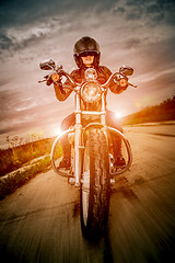 Image showing Biker girl on a motorcycle