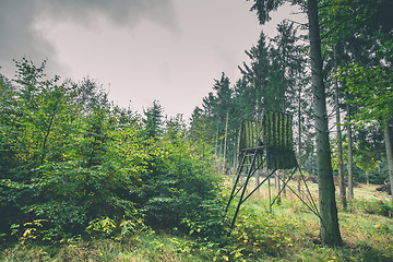 Image showing Hunting tower in green camoflage