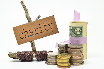 Image showing Coins and money with charity label