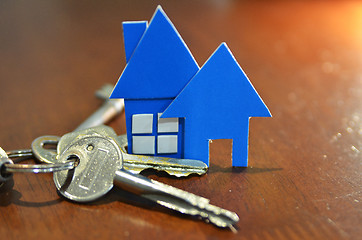 Image showing Bunch of keys with house shaped cardboard