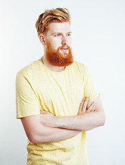 Image showing young handsome hipster ginger bearded guy looking brutal isolated on white background, lifestyle people concept 