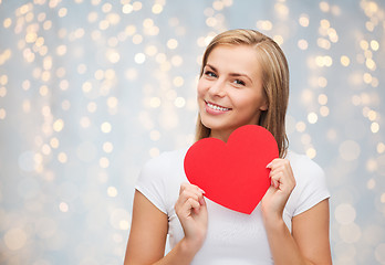 Image showing happy woman or teen girl with red heart shape