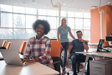 Image showing African American informal business woman working in the office