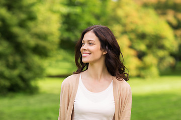 Image showing beautiful happy young woman in summer park