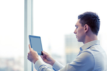 Image showing businessman with tablet pc in office