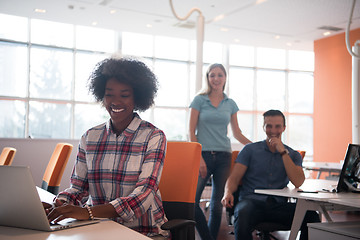 Image showing African American informal business woman working in the office