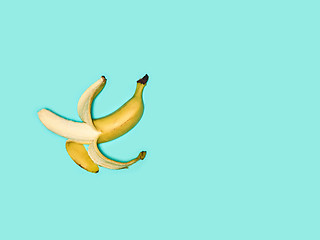 Image showing Single banana against blue background