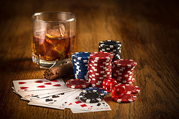 Image showing Cigar, chips for gamblings, drink and playing cards