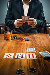Image showing The chips for gamblings, drink and playing cards