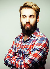 Image showing young handsome hipster ginger bearded guy looking brutal isolated on white background, lifestyle people concept 