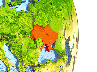 Image showing Ukraine in red on Earth