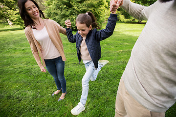 Image showing happy family walking in summer park and having fun