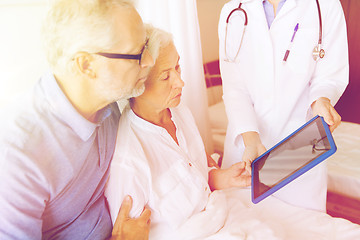 Image showing senior woman and doctor with tablet pc at hospital