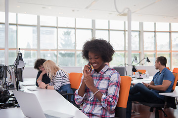 Image showing African American informal business woman working in the office