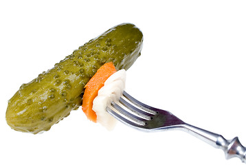 Image showing  Pickled cucumber on a fork