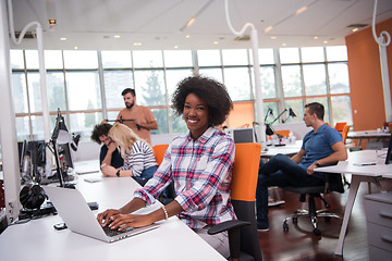 Image showing African American informal business woman working in the office