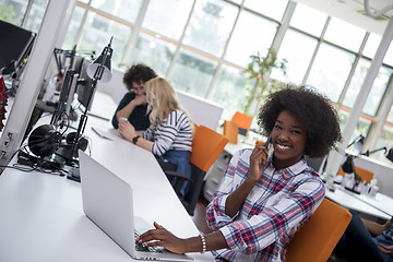 Image showing African American informal business woman working in the office