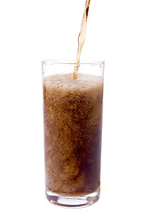 Image showing Pouring cola in to the glass