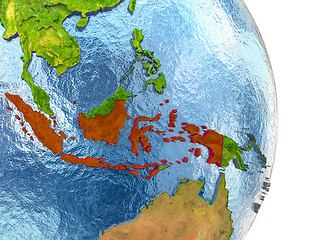 Image showing Indonesia in red on Earth