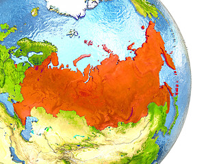 Image showing Russia in red on Earth