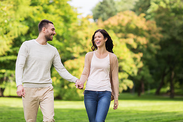 Image showing happy couple walking in summer park