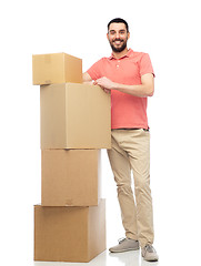 Image showing happy man with cardboard boxes