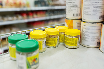 Image showing jars with food or spices at grocery shelf