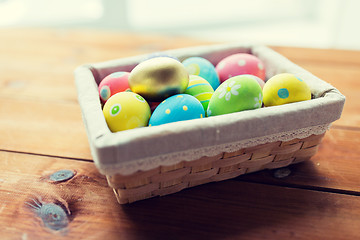 Image showing close up of colored easter eggs in basket