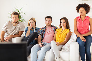 Image showing friends watching tv at home