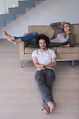 Image showing young couple relaxes in the living room